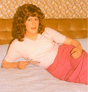 Joy lying on a York hotel bed